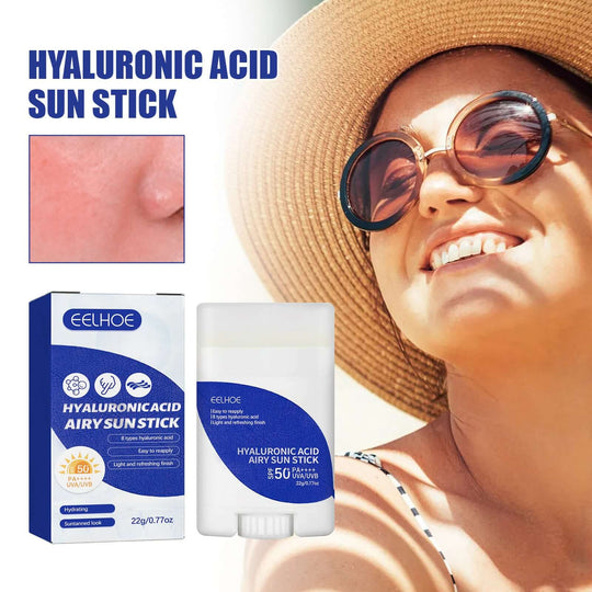 A stick and box of Eelhoe SPF50 moisturizer and sunscreen and a smiling woman's face with big hat wearing it