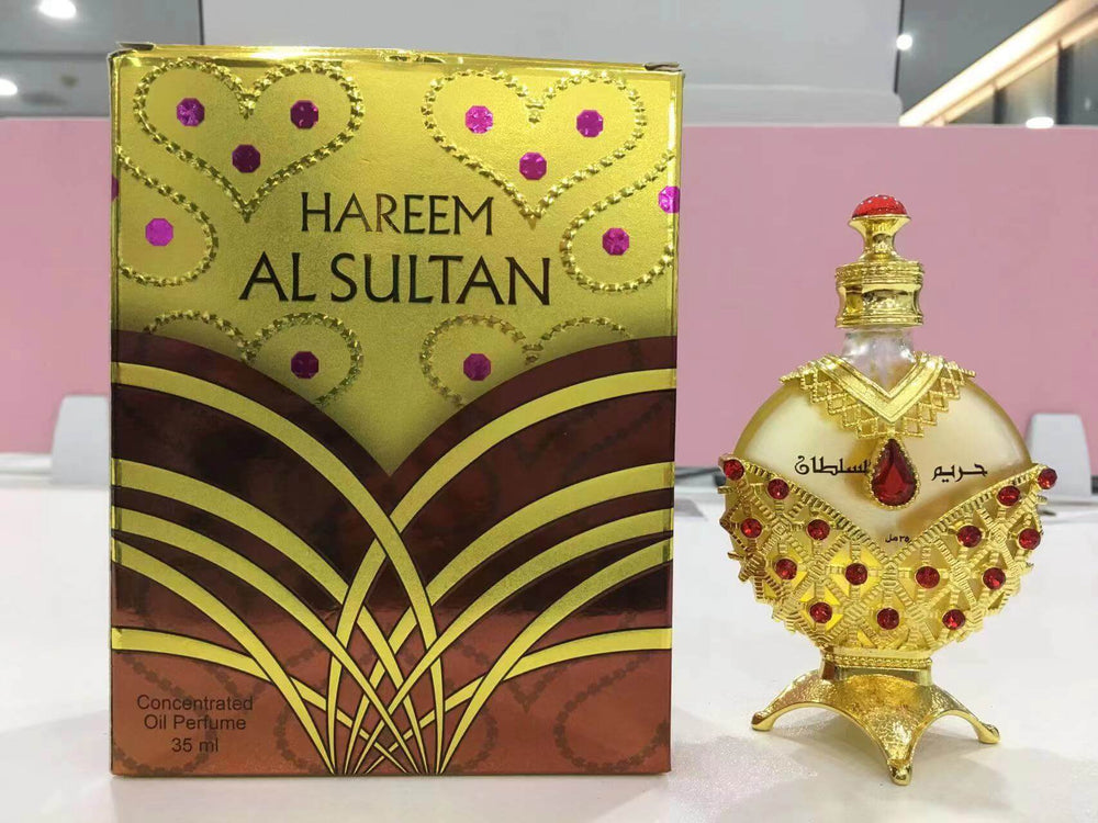 A bottle and a box of Hareem Al Sultan gold concentrated perfume oil