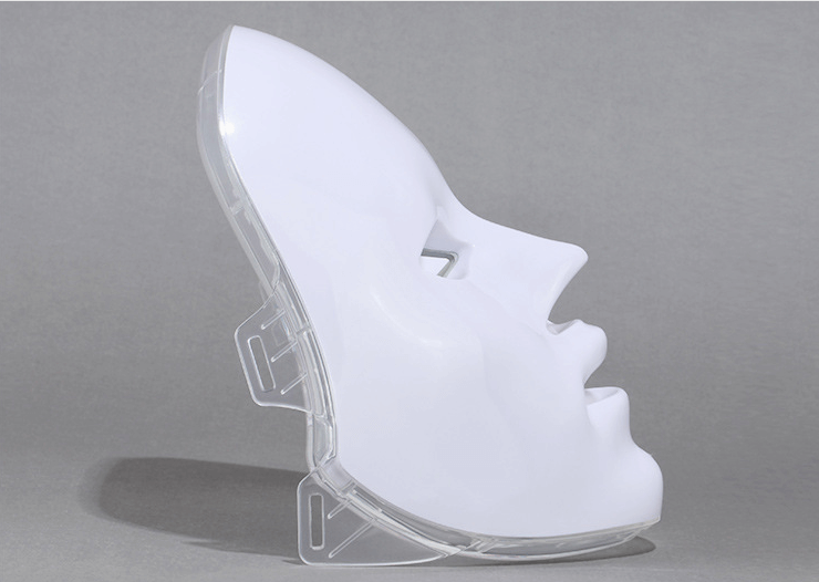 Side view of a 7 colors LED light skin rejuvenation mask 