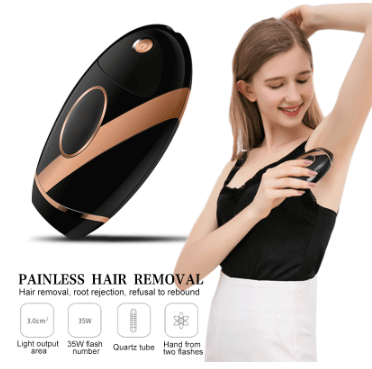 Black IPL hair removal device used by a woman for anderarm's hair removal