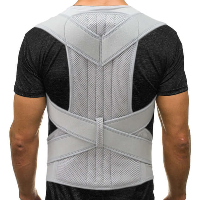 Rear view of man wearing a grey posture corrector