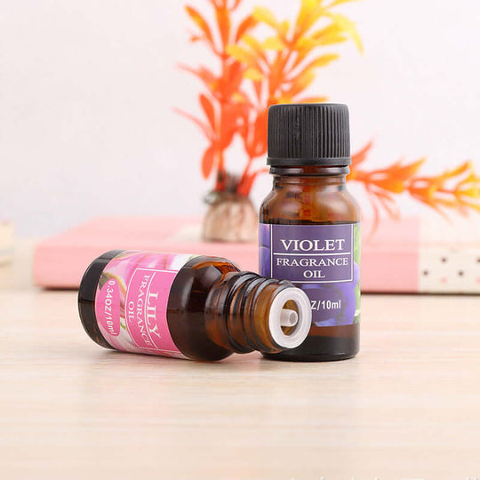 Violet and lilium fragrance oil bottles