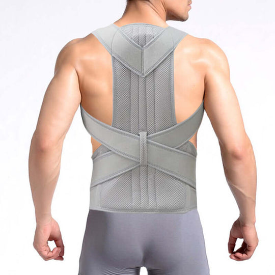 Rear view of a man wearing a grey posture corrector