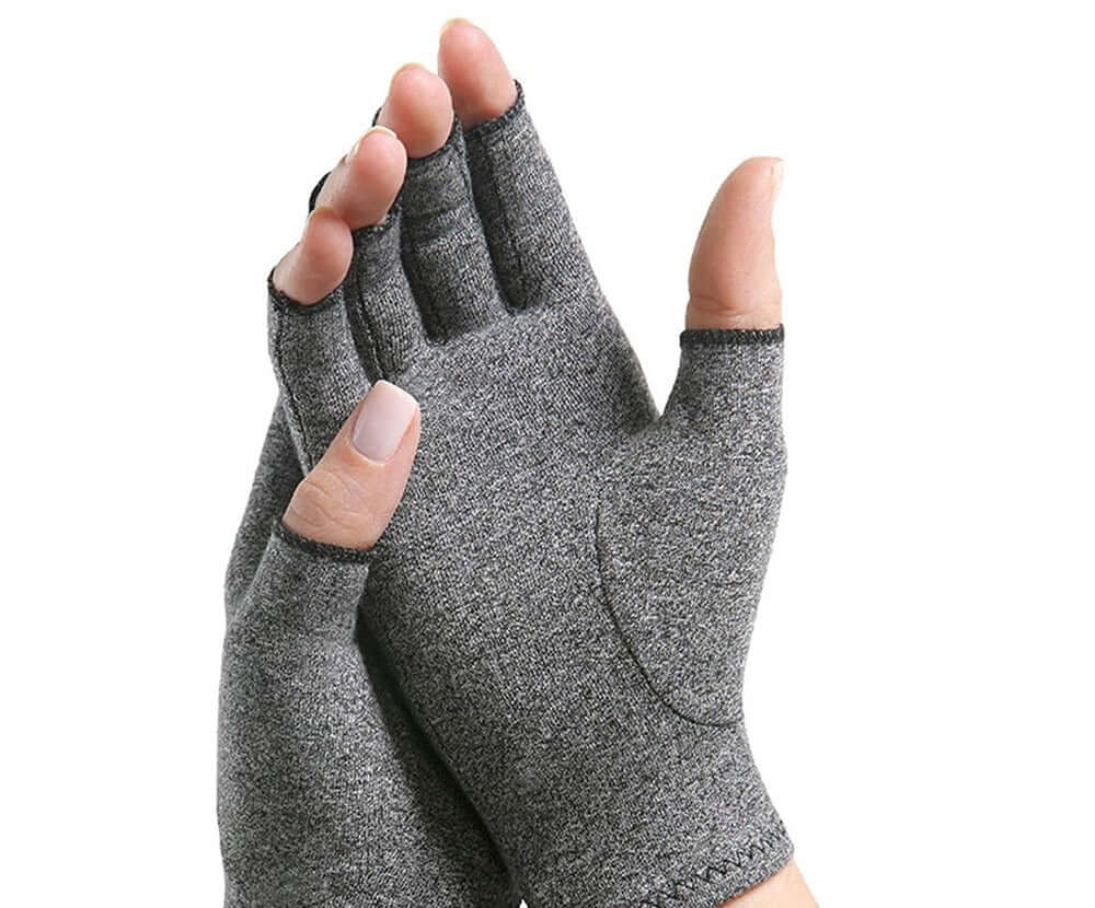 copper arthritis compression gloves weared on a woman's hands