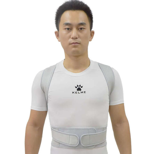 Front view of a man wearing grey posture corrector