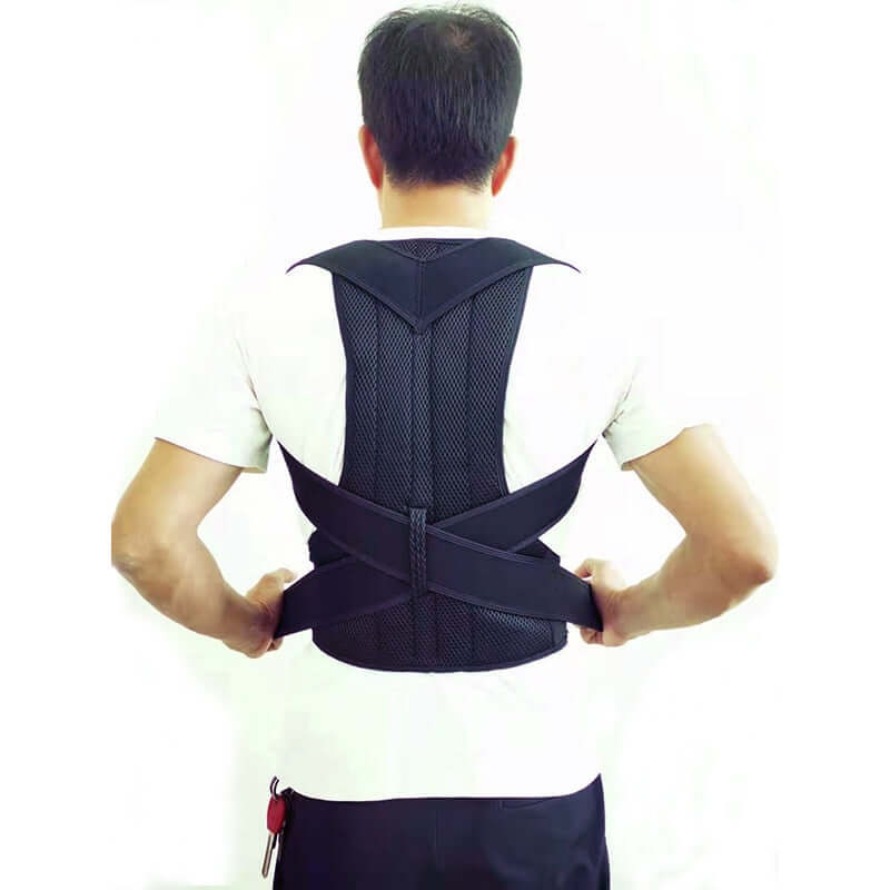 Rear view of a man wering a black posture corrector